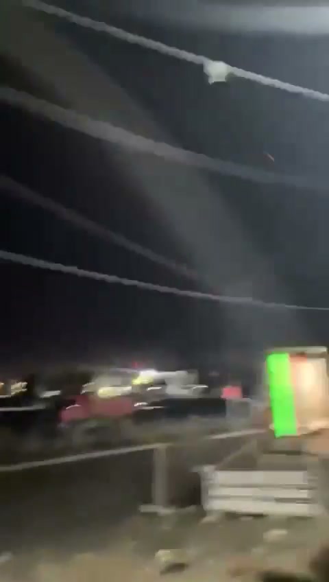 Footage captured the moment a bomb-laden drone crashes into (what appears to be) civilian populated areas in Topzawa, south of Erbil